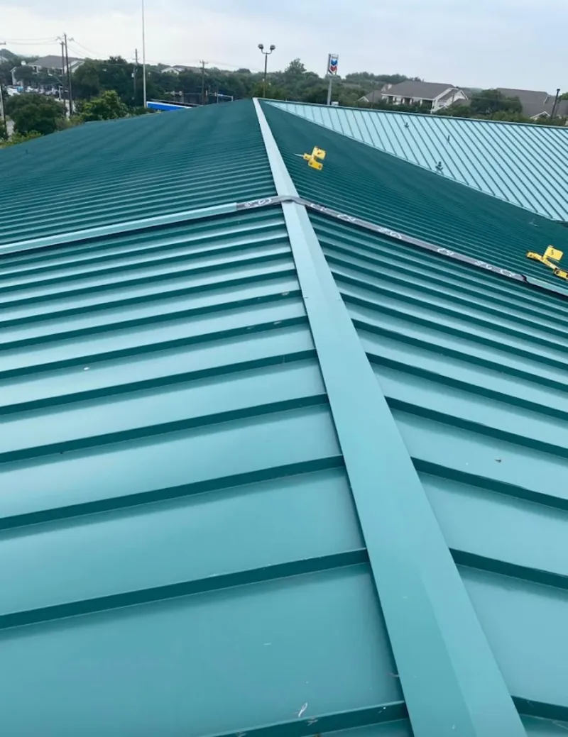 Green commercial metal roof ridge and valley for Metal Roof Repair in Milford